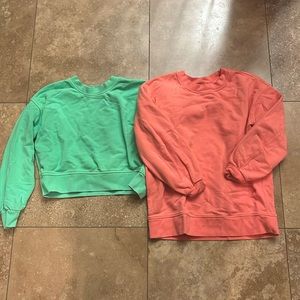 2 small lululemon pullovers green is cropped pink is regular